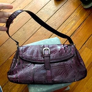 Purple handbag with magnetic clasp